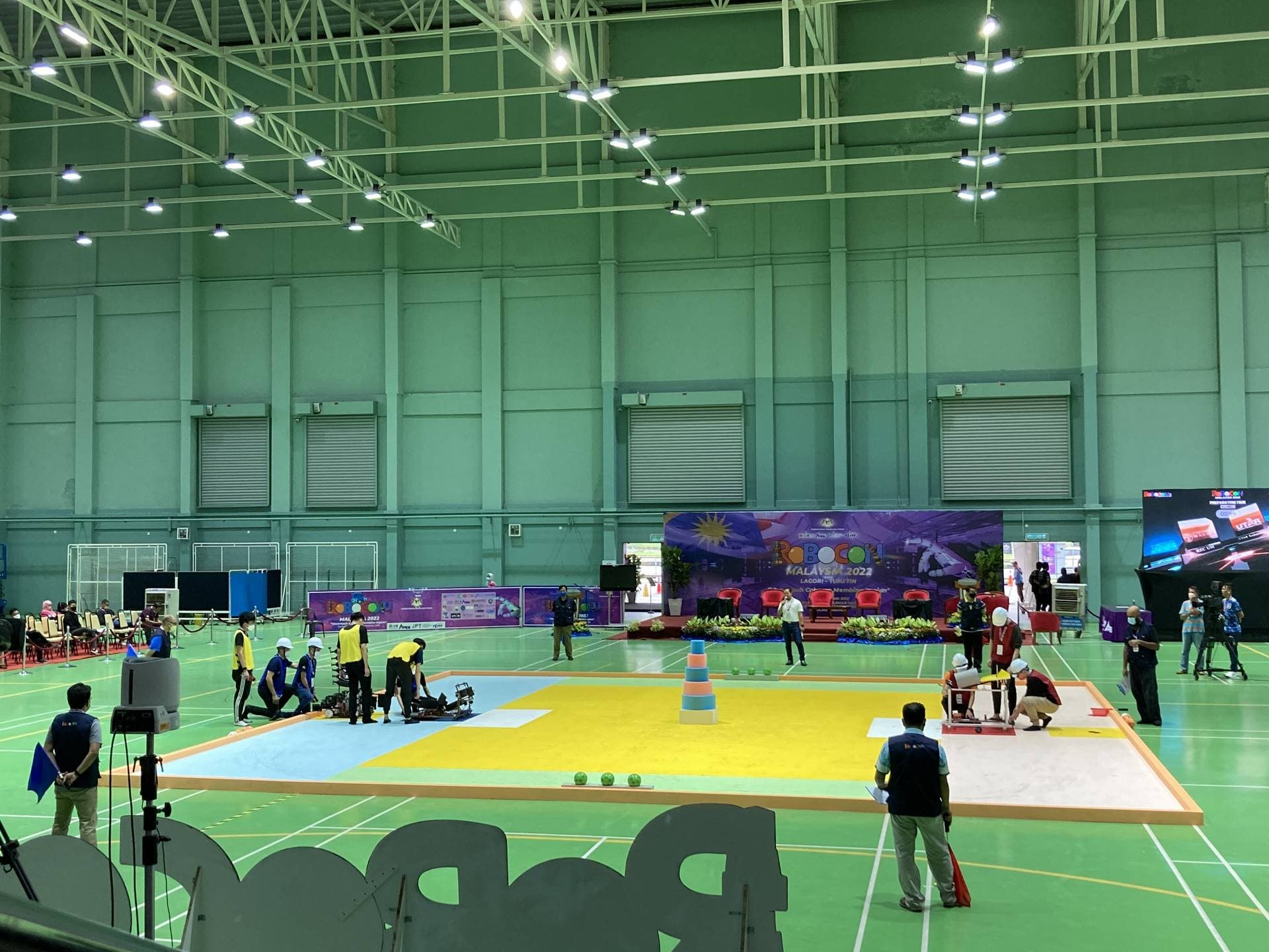 A team celebrating a victory at a robotics competition.